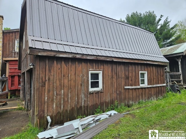 5162 Whig St, Little Valley, NY 14779 - view of property exterior with metal roof, an outbuilding, and a gambrel roof