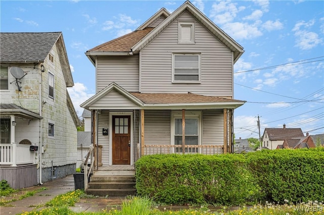 1001 15th St, Niagara Falls, NY 14301 - traditional-style home with covered porch and roof with shingles