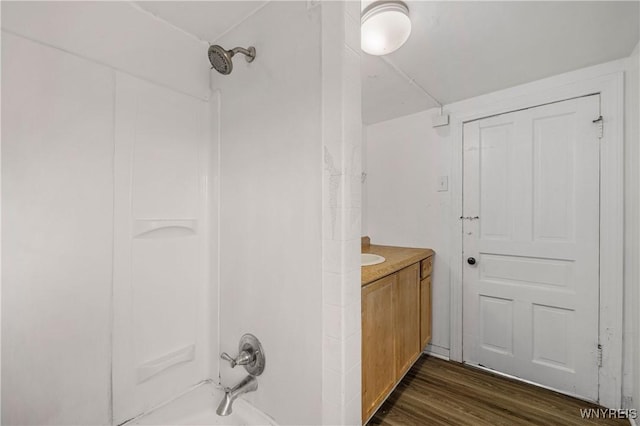 1001 15th St, Niagara Falls, NY 14301 - bathroom featuring wood finished floors, vanity, and shower / bath combination