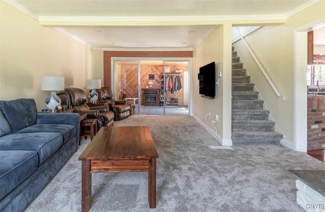carpeted living area with stairway, crown molding, and baseboards