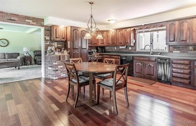 dining area with wood finished floors