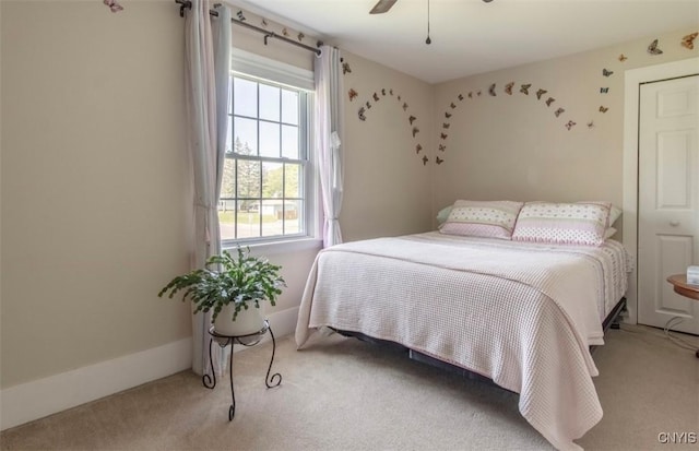 bedroom featuring carpet floors and a ceiling fan