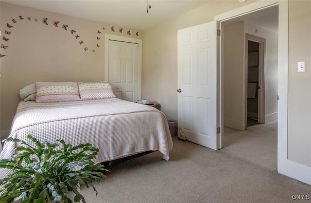 bedroom with light carpet