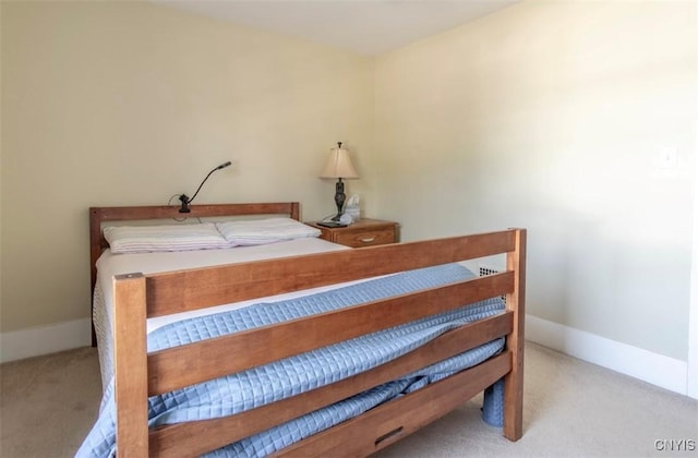 bedroom featuring carpet