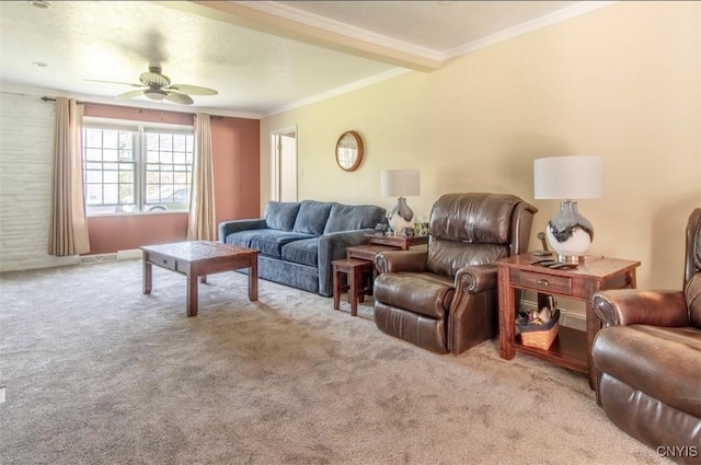 carpeted living room featuring ceiling fan and ornamental molding