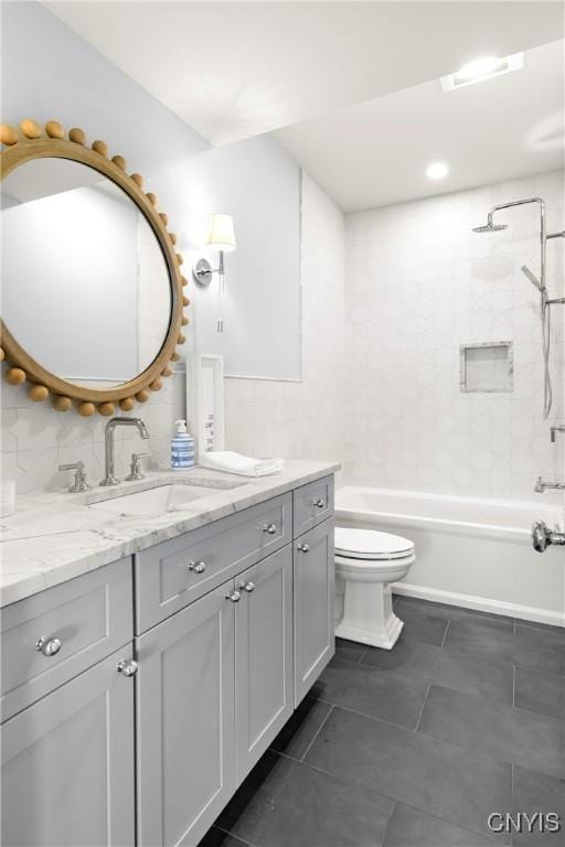 full bathroom with vanity, tile patterned flooring, toilet, and bathing tub / shower combination