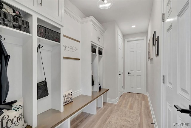 mudroom featuring light wood-style flooring, recessed lighting, and baseboards