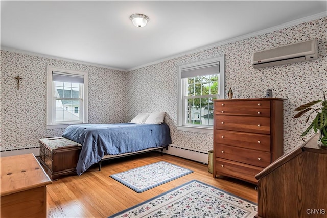 2810 Genesee St, Utica, NY 13502 - bedroom with a wall unit AC, a baseboard heating unit, ornamental molding, wood finished floors, and wallpapered walls