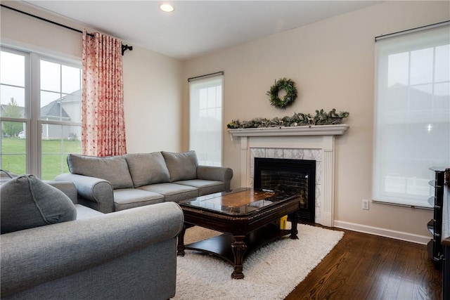 318 Wexford Ln, Horseheads, NY 14845 - living area featuring dark wood-style flooring, baseboards, recessed lighting, and a high end fireplace
