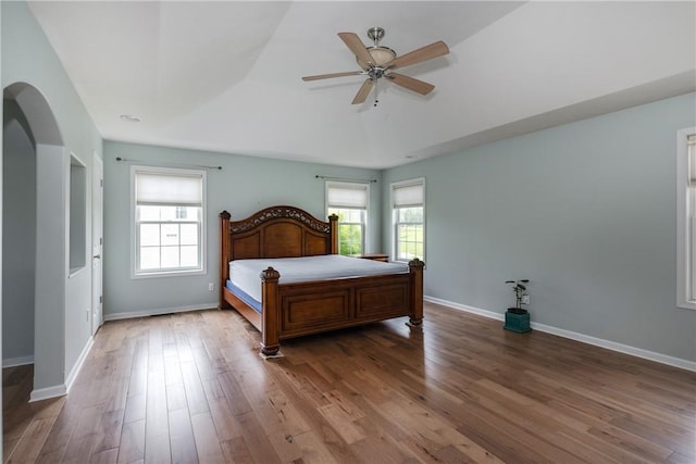 318 Wexford Ln, Horseheads, NY 14845 - bedroom featuring multiple windows, wood finished floors, baseboards, and vaulted ceiling