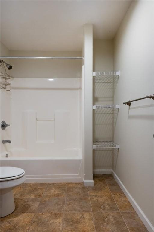 318 Wexford Ln, Horseheads, NY 14845 - bathroom with toilet, bathtub / shower combination, and baseboards