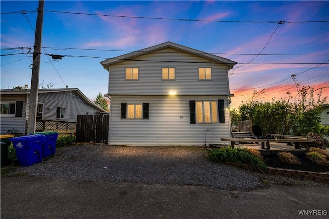 view of front of home with fence