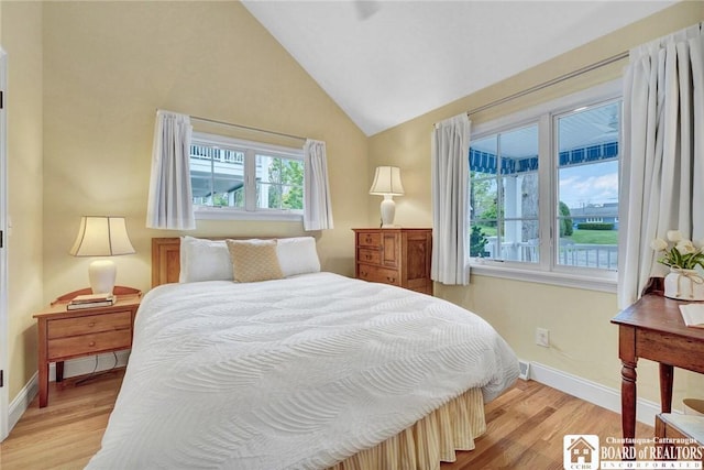 3 Maple Ave, Chautauqua, NY 14722 - bedroom featuring light wood-style floors, vaulted ceiling, and baseboards