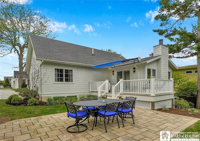 3 Maple Ave, Chautauqua, NY 14722 - back of property featuring outdoor dining space, a patio, a wooden deck, a chimney, and a shingled roof