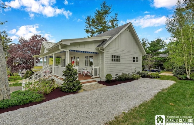 3 Maple Ave, Chautauqua, NY 14722 - view of property exterior featuring board and batten siding, a porch, and a shingled roof