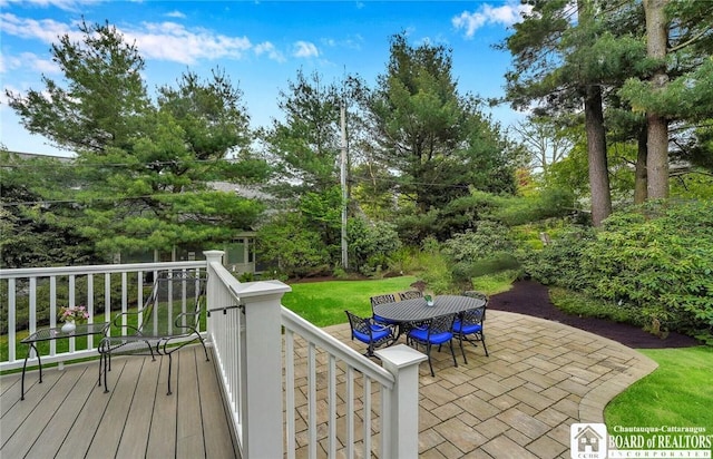 3 Maple Ave, Chautauqua, NY 14722 - view of patio with outdoor dining area and a deck