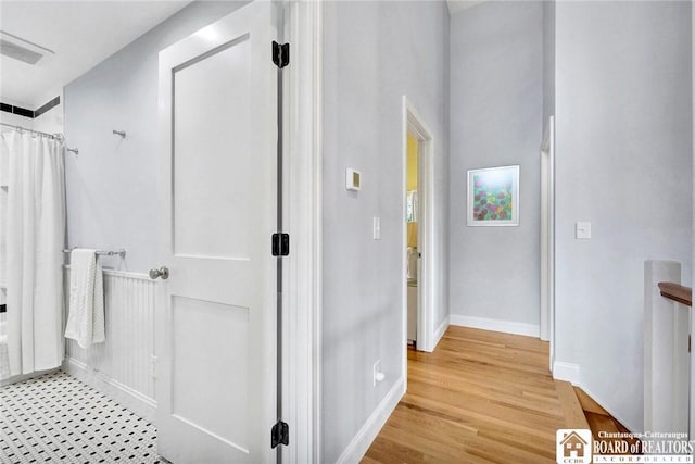3 Maple Ave, Chautauqua, NY 14722 - full bath with baseboards and wood finished floors