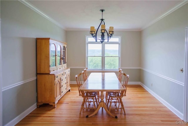 490 Hidden Falls Rd, Tully, NY 13159 - dining space featuring a chandelier, light wood-type flooring, baseboards, and ornamental molding
