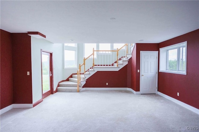 490 Hidden Falls Rd, Tully, NY 13159 - unfurnished living room with stairs, carpet, and baseboards