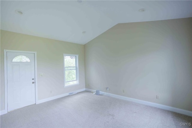 490 Hidden Falls Rd, Tully, NY 13159 - spare room with lofted ceiling, plenty of natural light, carpet floors, and baseboards