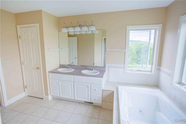 490 Hidden Falls Rd, Tully, NY 13159 - bathroom with tile patterned floors, a tub with jets, and double vanity