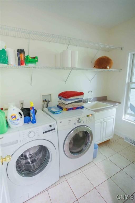 490 Hidden Falls Rd, Tully, NY 13159 - laundry room with a sink, washing machine and clothes dryer, light tile patterned floors, and baseboards