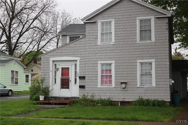 view of front of home with a front lawn