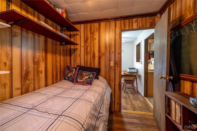 21 S Lake Rd, Deruyter, NY 13052 - bedroom with wood walls and dark wood finished floors