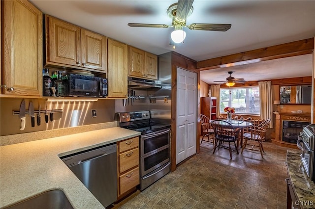 21 S Lake Rd, Deruyter, NY 13052 - kitchen with appliances with stainless steel finishes, a ceiling fan, light countertops, a sink, and under cabinet range hood