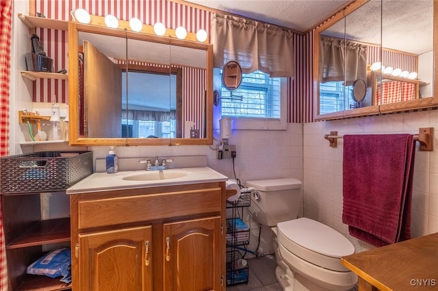 21 S Lake Rd, Deruyter, NY 13052 - bathroom with toilet, a textured ceiling, and vanity