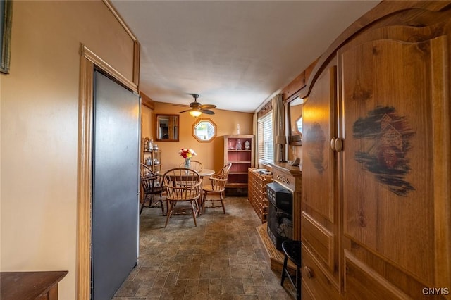 21 S Lake Rd, Deruyter, NY 13052 - dining room featuring stone finish flooring and a ceiling fan