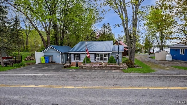 21 S Lake Rd, Deruyter, NY 13052 - view of front of home with driveway and metal roof