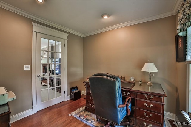 home office featuring wood finished floors, crown molding, and baseboards