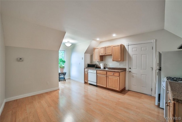 kitchen featuring white appliances, light wood-style flooring, recessed lighting, vaulted ceiling, and baseboards