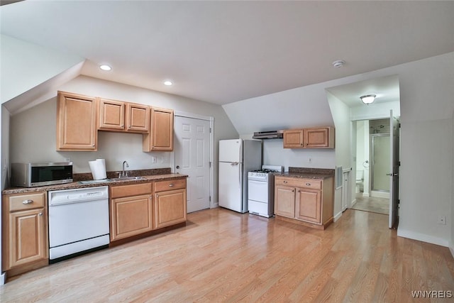 kitchen featuring white appliances, a sink, light wood-type flooring, recessed lighting, and ventilation hood