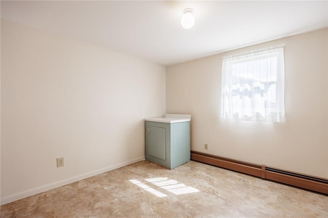 89 Chapel St, Mount Morris, NY 14510 - unfurnished room with a baseboard radiator and baseboards