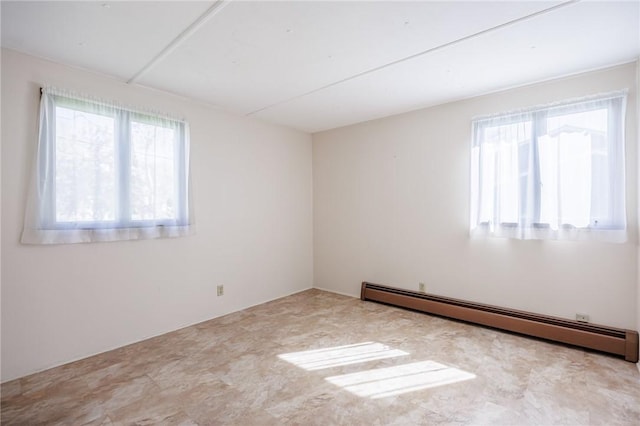 89 Chapel St, Mount Morris, NY 14510 - spare room featuring a baseboard heating unit
