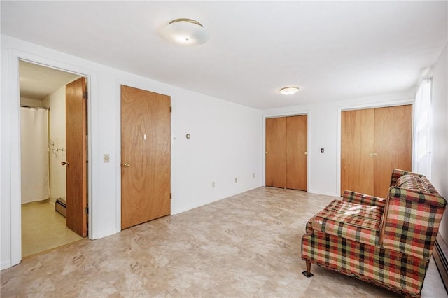 89 Chapel St, Mount Morris, NY 14510 - sitting room with a baseboard heating unit