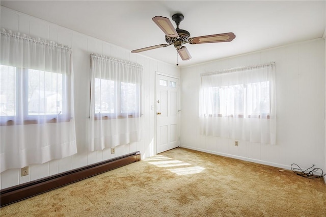 89 Chapel St, Mount Morris, NY 14510 - carpeted spare room featuring baseboard heating and ceiling fan
