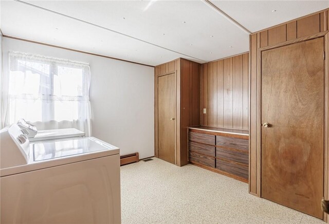 89 Chapel St, Mount Morris, NY 14510 - unfurnished bedroom with washer and clothes dryer, a baseboard radiator, and wooden walls