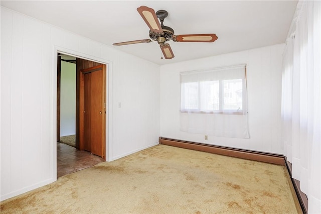 89 Chapel St, Mount Morris, NY 14510 - unfurnished room featuring a baseboard radiator, carpet, baseboards, and a ceiling fan