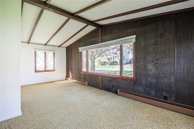89 Chapel St, Mount Morris, NY 14510 - carpeted spare room featuring a baseboard radiator and wood walls
