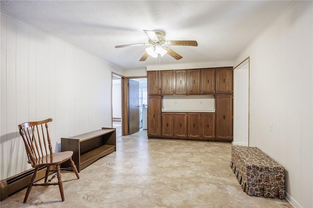 89 Chapel St, Mount Morris, NY 14510 - sitting room with ceiling fan, crown molding, a baseboard radiator, and light flooring