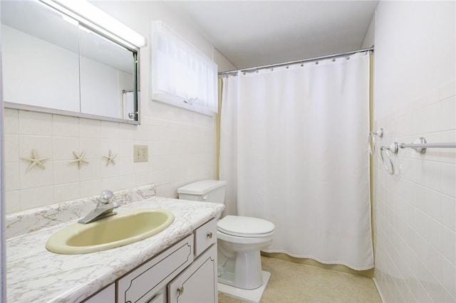 89 Chapel St, Mount Morris, NY 14510 - bathroom with vanity, toilet, tile walls, and a shower with shower curtain