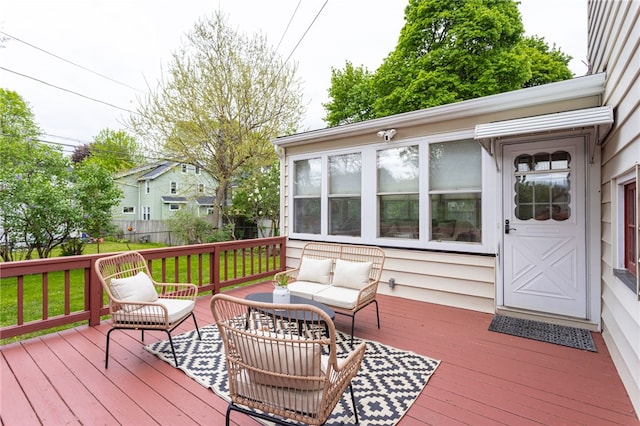164 Elm Dr, Rochester, NY 14609 - wooden deck with an outdoor hangout area and fence