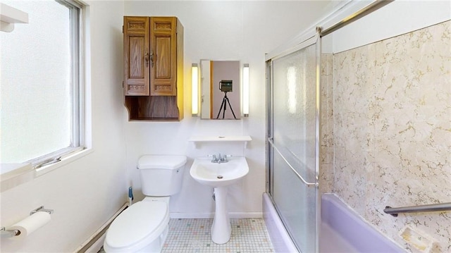 22 Suncrest Ter, Oneonta-City, NY 13820 - bathroom featuring toilet, shower / bath combination with glass door, and tile patterned flooring