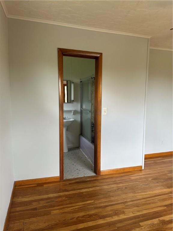 22 Suncrest Ter, Oneonta-City, NY 13820 - empty room with wood finished floors, baseboards, and ornamental molding