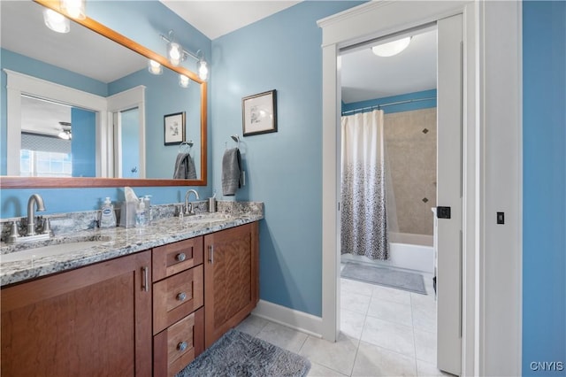 full bathroom featuring double vanity, tile patterned floors, baseboards, and shower / bathtub combination with curtain