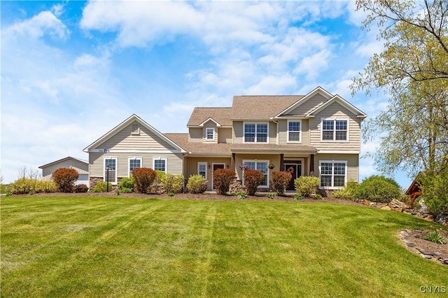 view of front of property featuring a front lawn and stone siding
