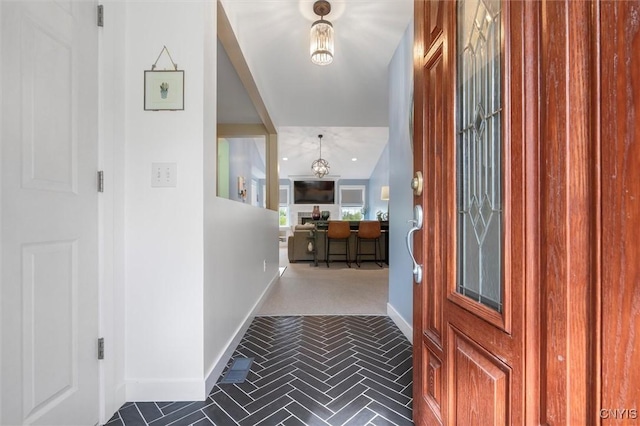 foyer entrance with baseboards
